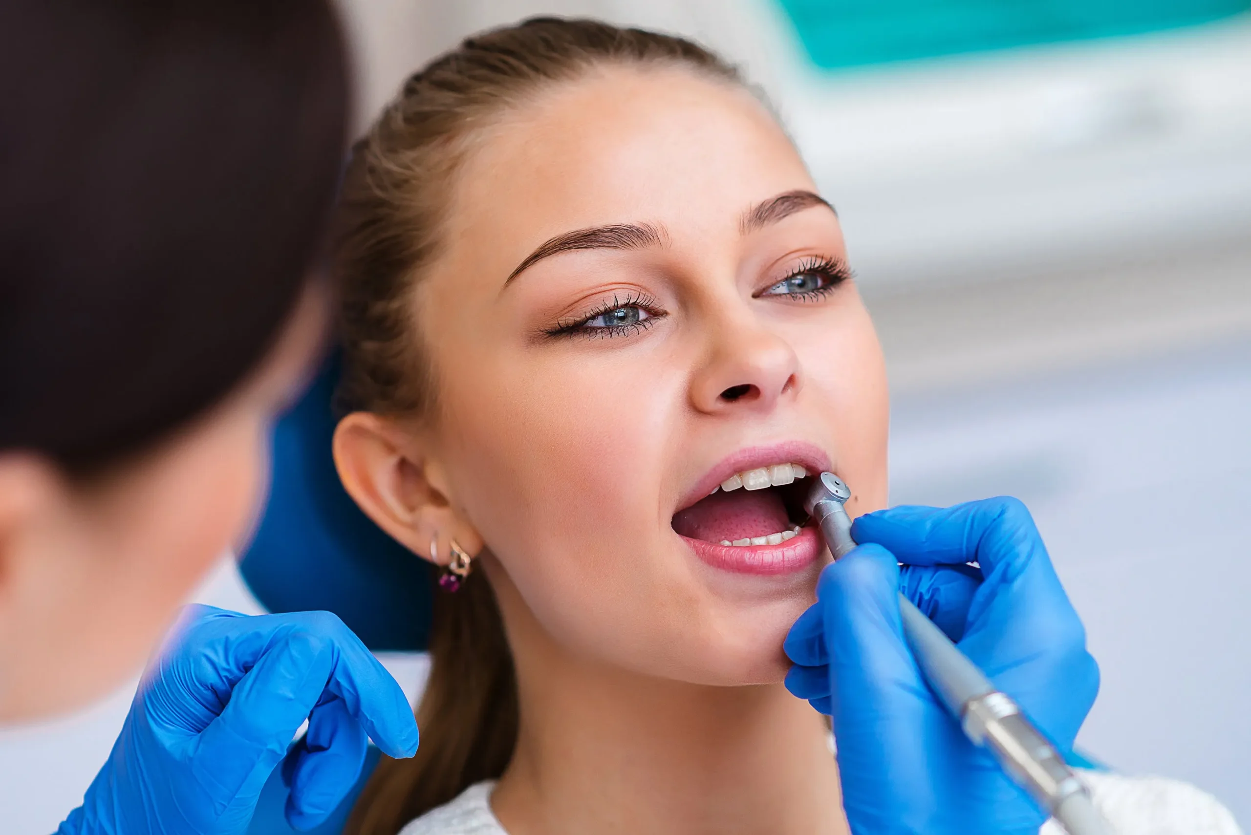 periodontist reviewing gum disease treatment plan with patient at Heart of Hingham Dental in Hingham MA